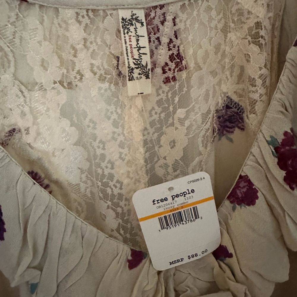 New with tags FREE PEOPLE INTIMATELY cream/lilac/pink ruffled bodysuit small